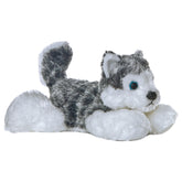 A gray and white husky plush from Mini Flopsie by Aurora with bright blue eyes and a fluffy tail.